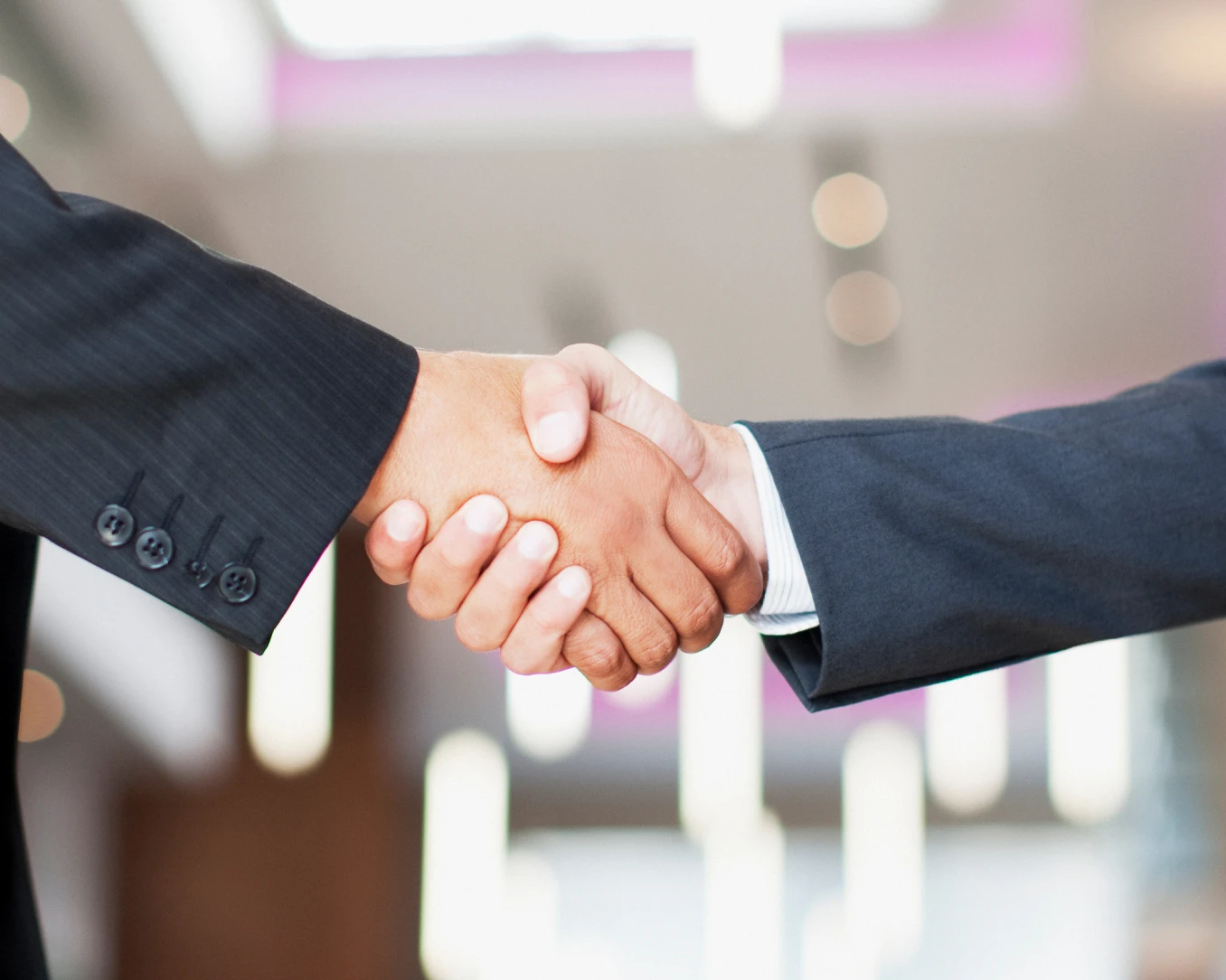 Close-up of a professional handshake